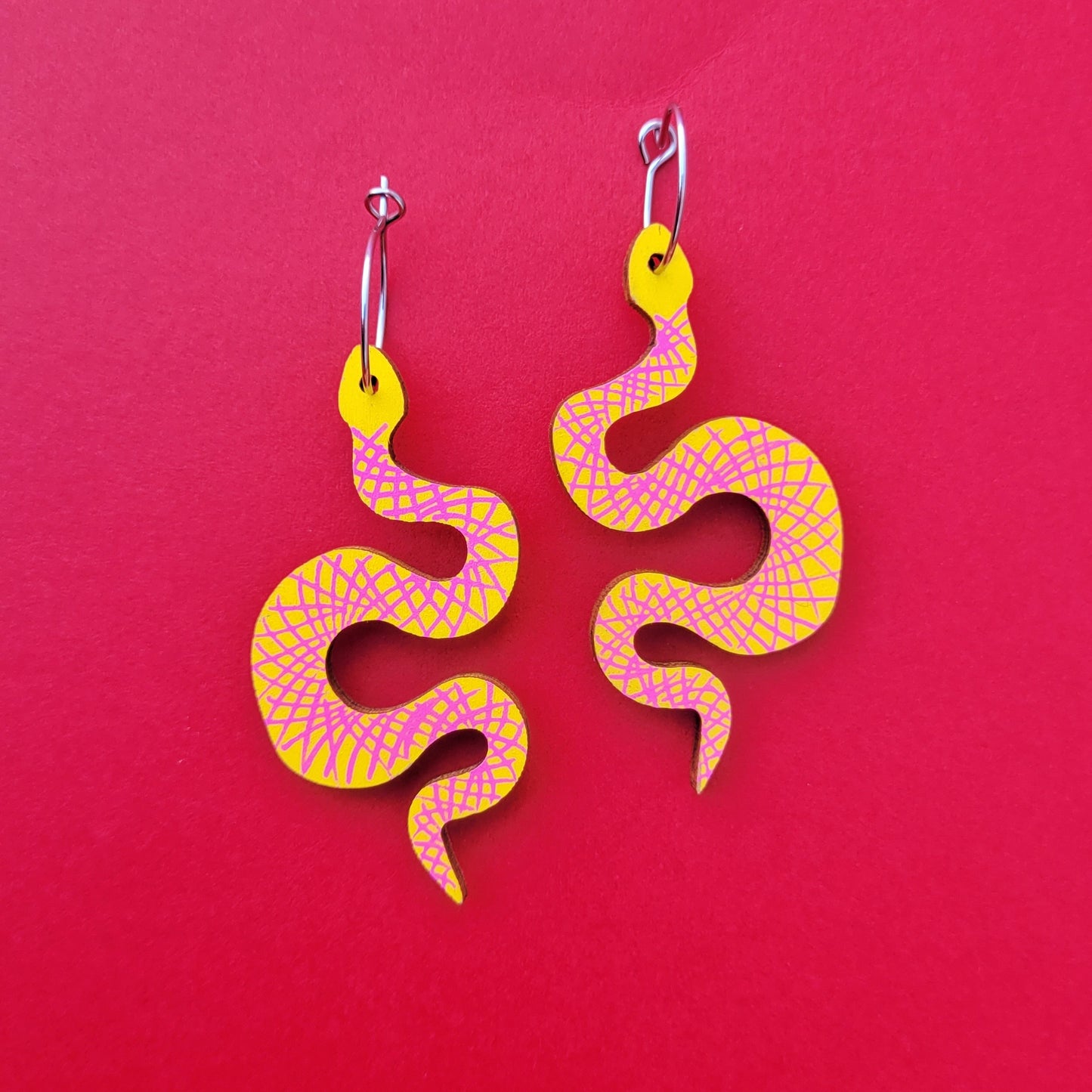 Yellow pink snake earrings