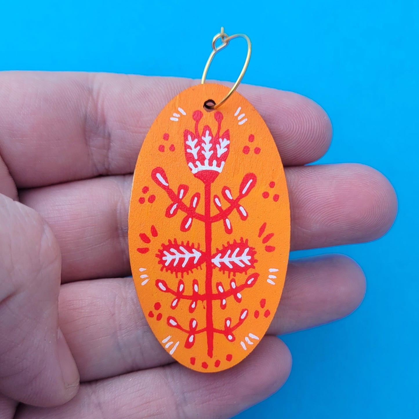 Orange folk earrings